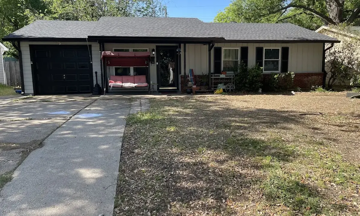 Asphalt Shingle Roof Repair crew at work on a residential roof in Oak Grove